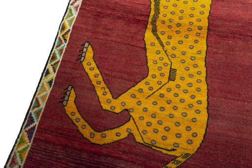 Backside of handmade 2000s Persian Gabbeh rug showing knot structure and weave density