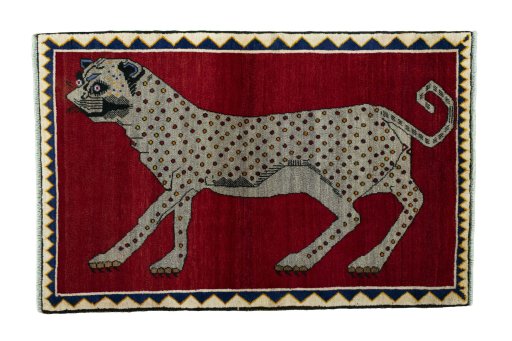 Full view of 2000s Persian Gabbeh rug from Iran / Persia, 159 × 103 cm in Red tones