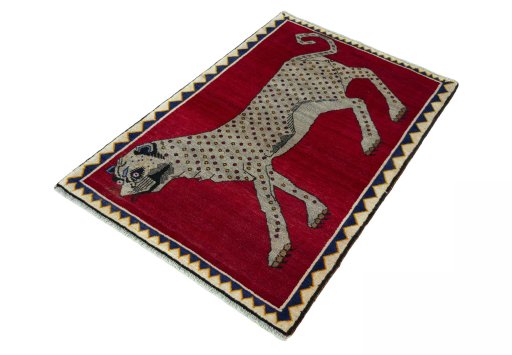 Corner detail of 2000s Persian Gabbeh rug showing border pattern and Wool pile