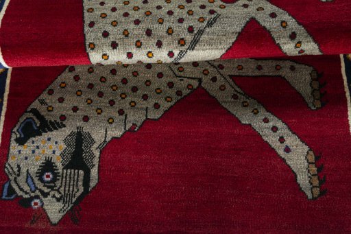Full view of 2000s Persian Gabbeh rug from Iran / Persia, 159 × 103 cm in Red tones