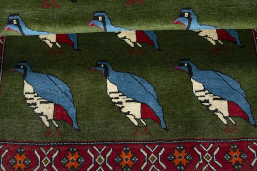 Full view of 2000s Persian Gabbeh rug from Iran / Persia, 145 × 111 cm in Green tones