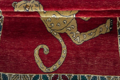Full view of 2000s Persian Gabbeh rug from Iran / Persia, 167 × 114 cm in Red tones