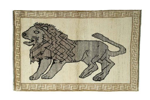 Full view of 2000s Persian Gabbeh rug from Iran / Persia, 177 × 115 cm in Beige tones