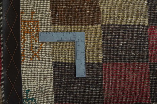 Close-up detail of 2000s Persian Gabbeh rug from Iran / Persia showing Wool weave