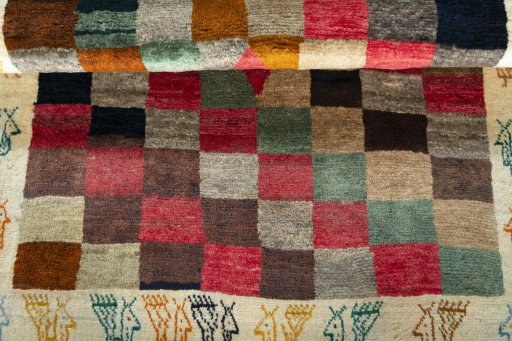 Full view of 2000s Persian Gabbeh rug from Iran / Persia, 151 × 112 cm in Multi Color tones