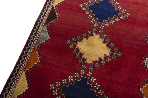 Backside of handmade 2000s Persian Gabbeh rug showing knot structure and weave density