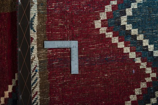 Close-up detail of 2000s Persian Gabbeh rug from Iran / Persia showing Wool weave