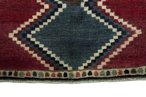 Central medallion detail of 2000s Persian Gabbeh rug from Iran / Persia