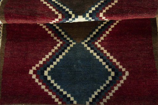 Full view of 2000s Persian Gabbeh rug from Iran / Persia, 145 × 102 cm in Multi Color tones