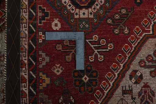 Surface texture of 2000s Persian Gabbeh rug with natural Wool and intricate pattern