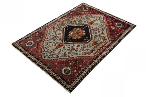 Corner detail of 2000s Persian Gabbeh rug showing border pattern and Wool pile