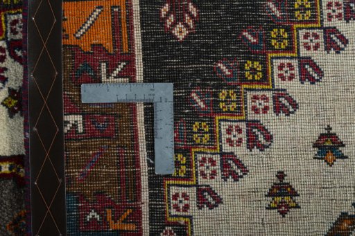 Close-up detail of 2000s Persian Gabbeh rug from Iran / Persia showing Wool weave