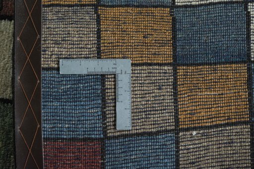 Close-up detail of 2000s Persian Gabbeh rug from Iran / Persia showing Wool weave