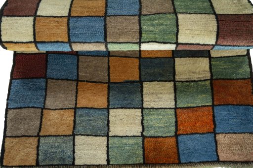 Full view of 2000s Persian Gabbeh rug from Iran / Persia, 119 × 80 cm in Multi Color tones