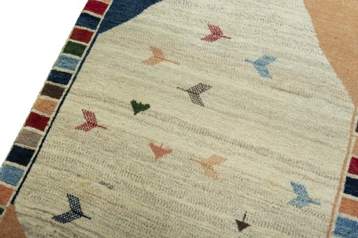 Backside of handmade 2000s Persian Gabbeh rug showing knot structure and weave density