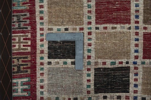Close-up detail of 2000s Persian Gabbeh rug from Iran / Persia showing Wool weave
