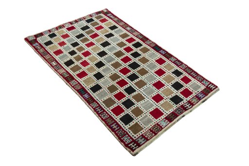 Close-up detail of 2000s Persian Gabbeh rug from Iran / Persia showing Wool weave