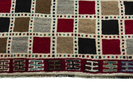 Central medallion detail of 2000s Persian Gabbeh rug from Iran / Persia