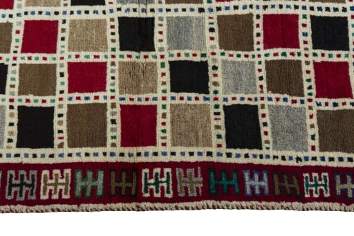 Close-up detail of 2000s Persian Gabbeh rug from Iran / Persia showing Wool weave