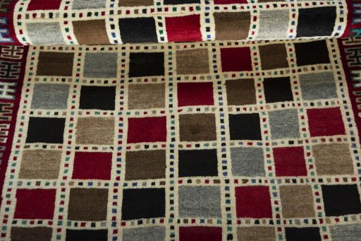 Full view of 2000s Persian Gabbeh rug from Iran / Persia, 176 × 107 cm in Multi Color tones