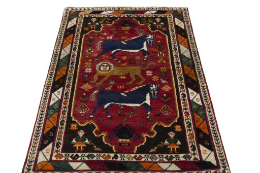 Surface texture of 2000s Persian Gabbeh rug with natural Wool and intricate pattern