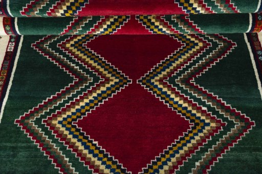 Full view of 2000s Persian Gabbeh rug from Iran / Persia, 218 × 142 cm in Multi Color tones