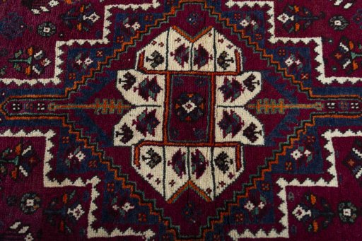 Central medallion detail of 2000s Persian Gabbeh rug from Iran / Persia