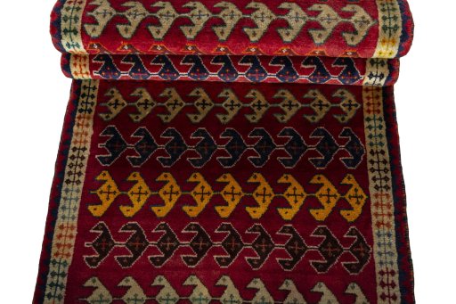 Full view of 2000s Persian Gabbeh rug from Iran / Persia, 186 × 77 cm in Red tones