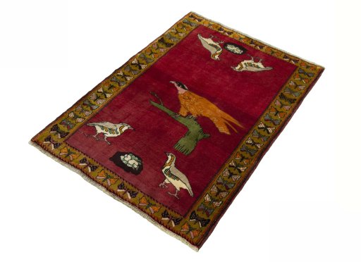 Corner detail of 2000s Persian Gabbeh rug showing border pattern and Wool pile