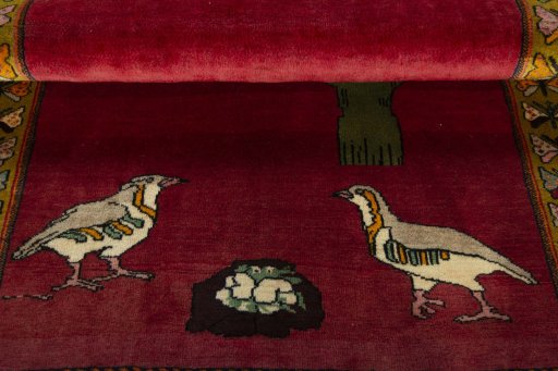 Full view of 2000s Persian Gabbeh rug from Iran / Persia, 150 × 105 cm in Red tones