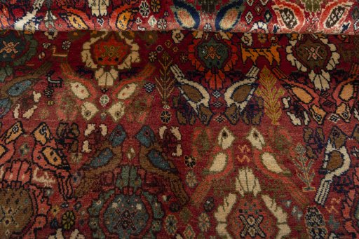 Full view of 2000s Persian Gabbeh rug from Iran / Persia, 240 × 160 cm in Red tones