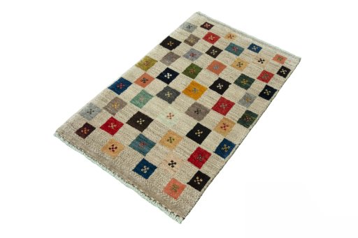 Corner detail of New Persian Gabbeh rug showing border pattern and Wool pile