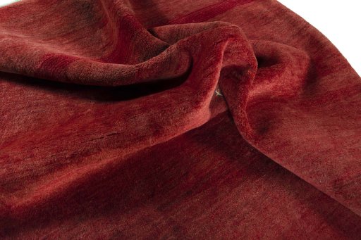 Corner detail of New Persian Gabbeh rug showing border pattern and Wool pile