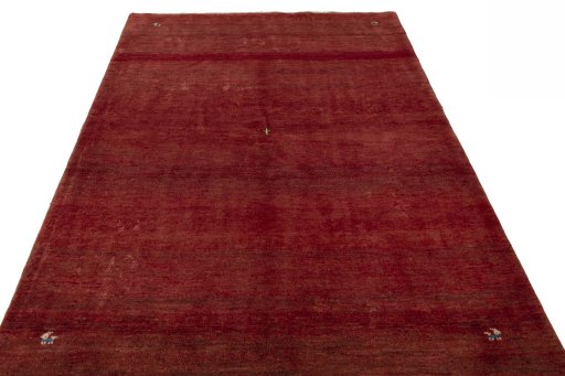 Surface texture of New Persian Gabbeh rug with natural Wool and intricate pattern