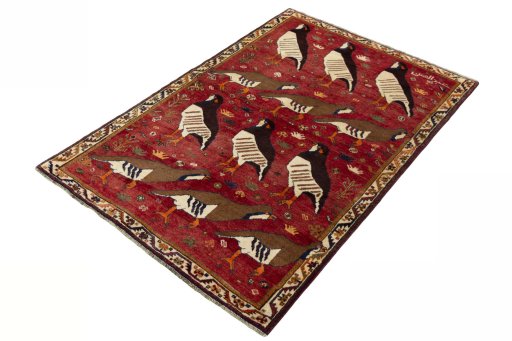 Corner detail of 1970s Persian Gabbeh rug showing border pattern and Wool pile
