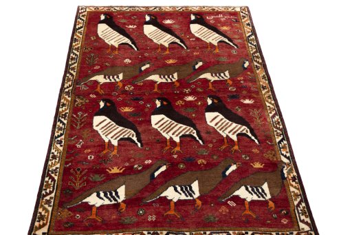 Surface texture of 1970s Persian Gabbeh rug with natural Wool and intricate pattern