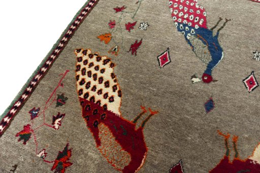 Backside of handmade 2000s Persian Gabbeh rug showing knot structure and weave density