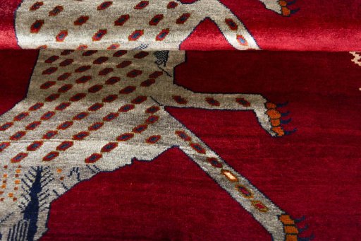Full view of 2000s Persian Gabbeh rug from Iran / Persia, 188 × 122 cm in Red tones