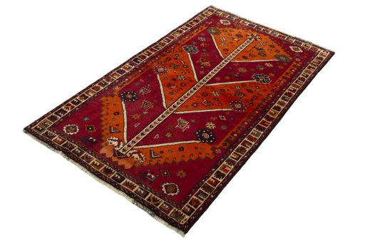 Corner detail of 2000s Persian Gabbeh rug showing border pattern and Wool pile