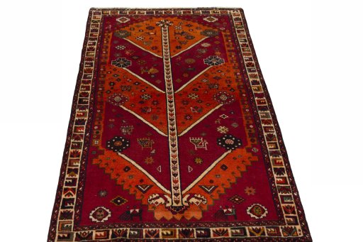 Surface texture of 2000s Persian Gabbeh rug with natural Wool and intricate pattern