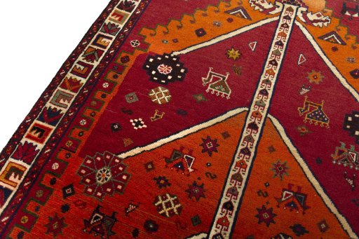 Backside of handmade 2000s Persian Gabbeh rug showing knot structure and weave density