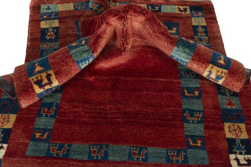 Corner detail of New Persian Gabbeh rug showing border pattern and Wool pile