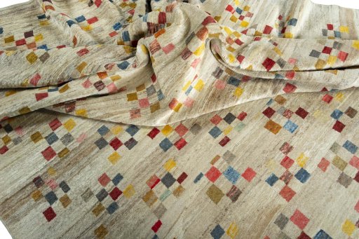 Corner detail of 1970s Persian Gabbeh rug showing border pattern and Wool pile