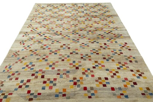 Surface texture of 1970s Persian Gabbeh rug with natural Wool and intricate pattern