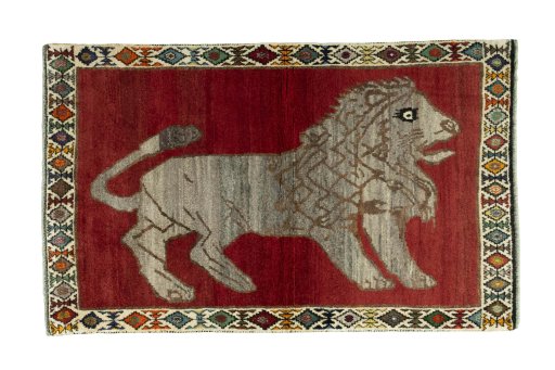 Full view of 2000s Persian Gabbeh rug from Iran / Persia, 182 × 112 cm in Red tones