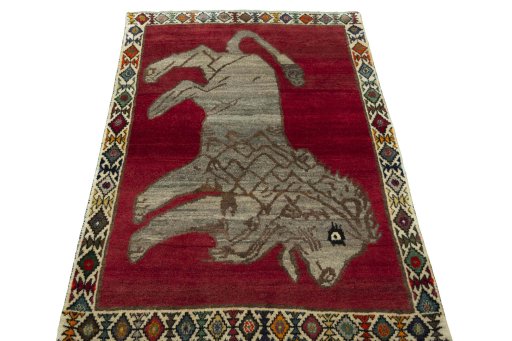 Surface texture of 2000s Persian Gabbeh rug with natural Wool and intricate pattern