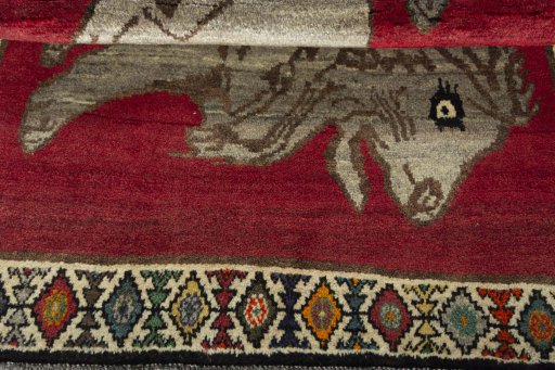 Full view of 2000s Persian Gabbeh rug from Iran / Persia, 182 × 112 cm in Red tones