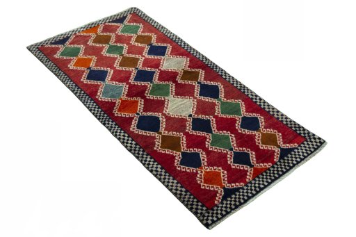 Close-up detail of 2000s Persian Gabbeh rug from Iran / Persia showing Wool weave