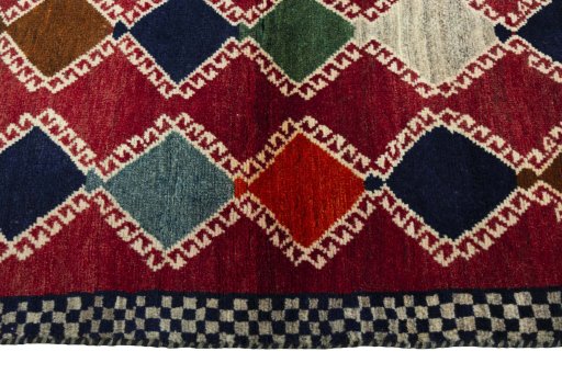Close-up detail of 2000s Persian Gabbeh rug from Iran / Persia showing Wool weave