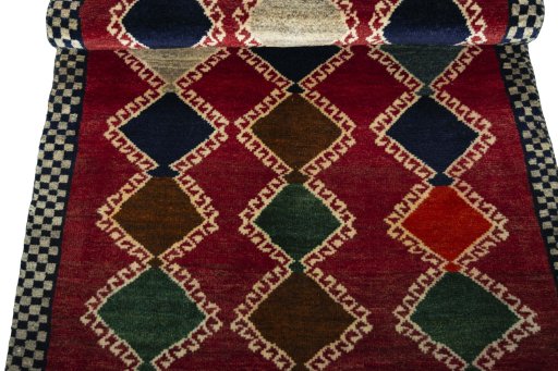 Full view of 2000s Persian Gabbeh rug from Iran / Persia, 178 × 88 cm in Red tones